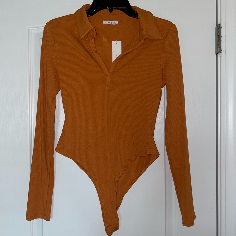 Brand new w tags Mustard color long sleeve body suit